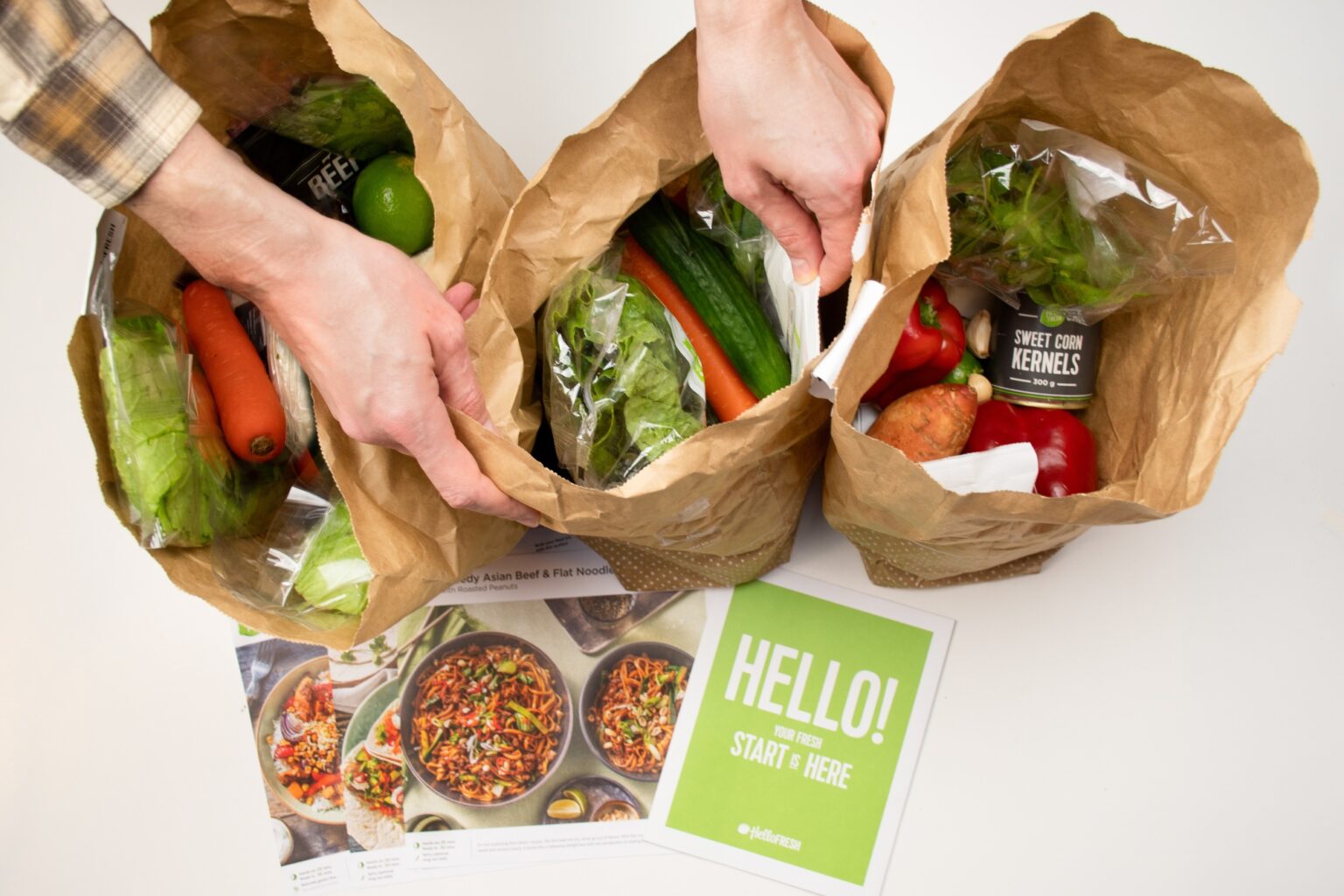 Hello fresh meal kits in a paper bags