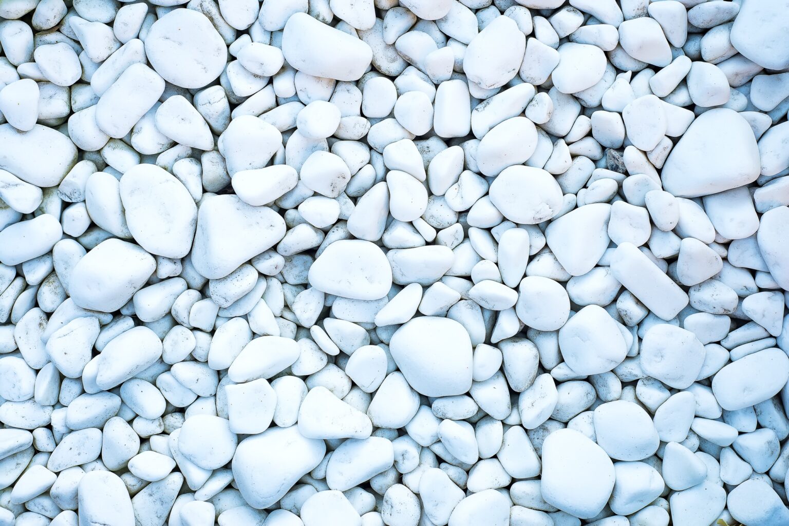 White pebble and sea stones background