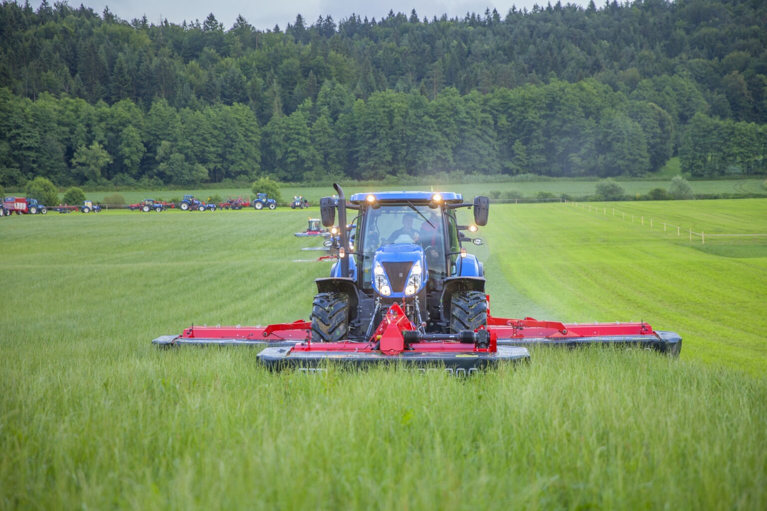 Mower on a green field